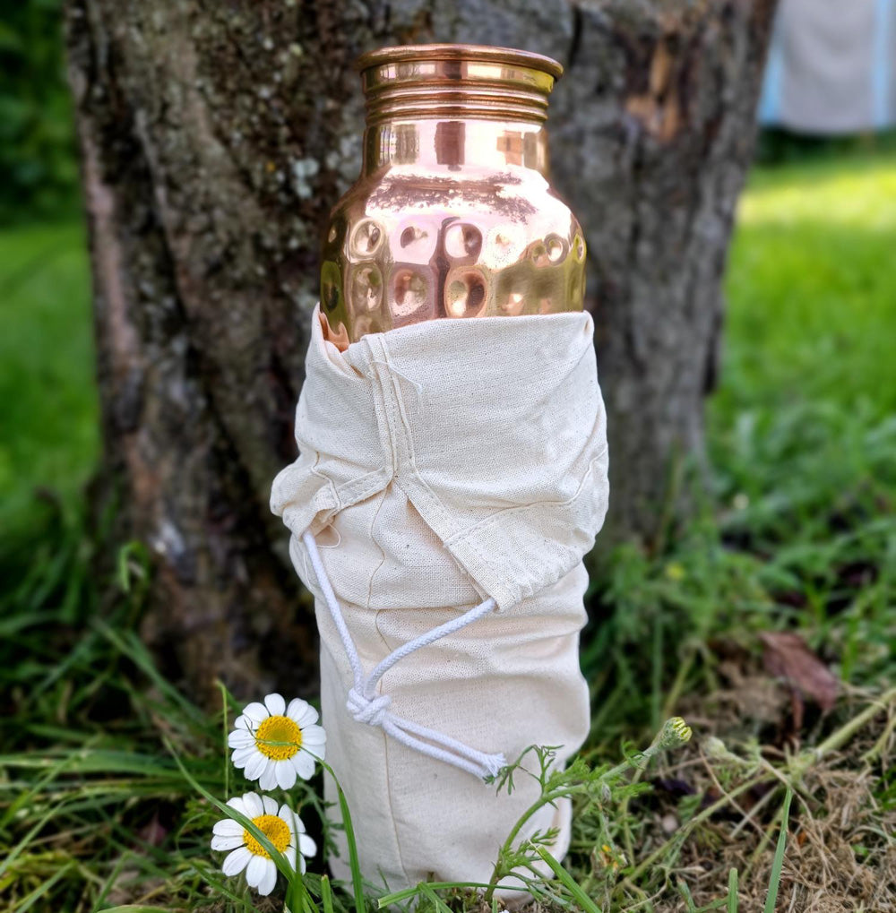 copper water bottle with cotton bag