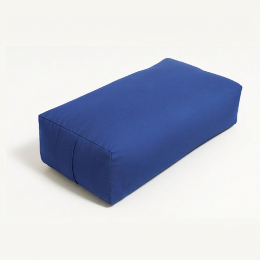 Blue iyengar yoga bolster on a white background