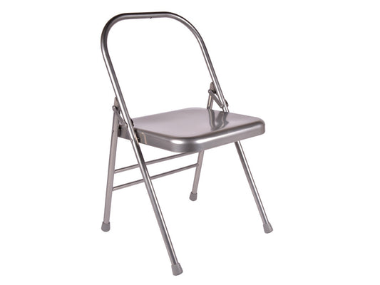 Metal folding yoga chair on a white background