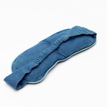 Blue yoga eye pillow on a white background