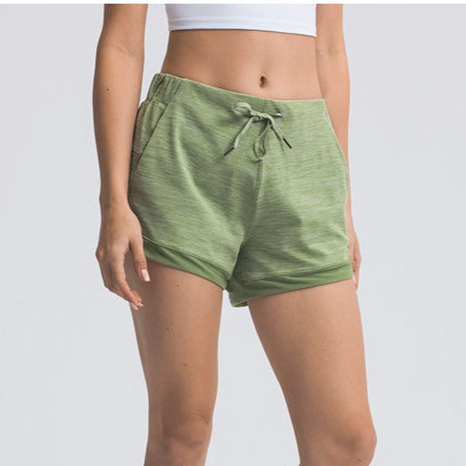 Green womens yoga short pockets