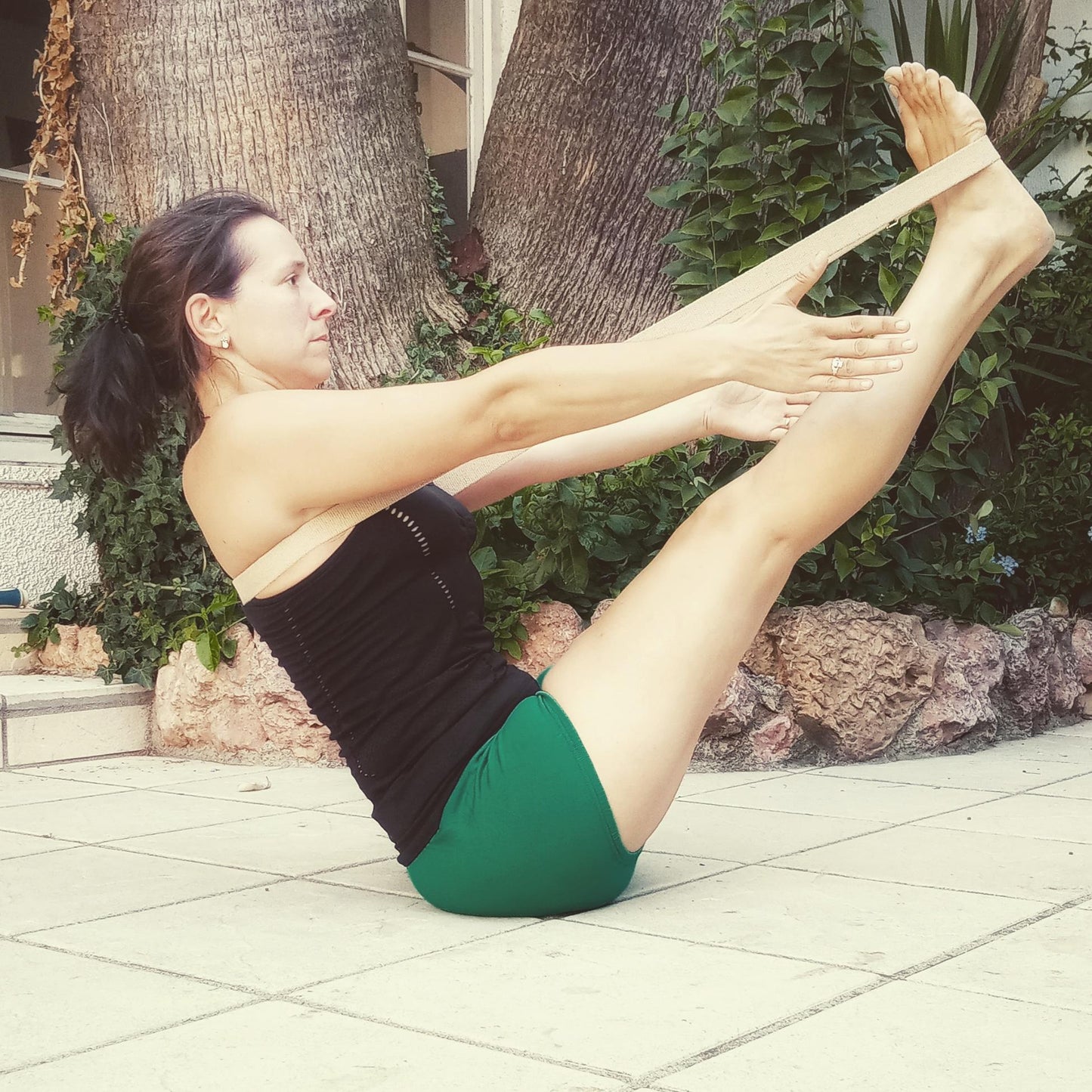 navasana with yoga strap